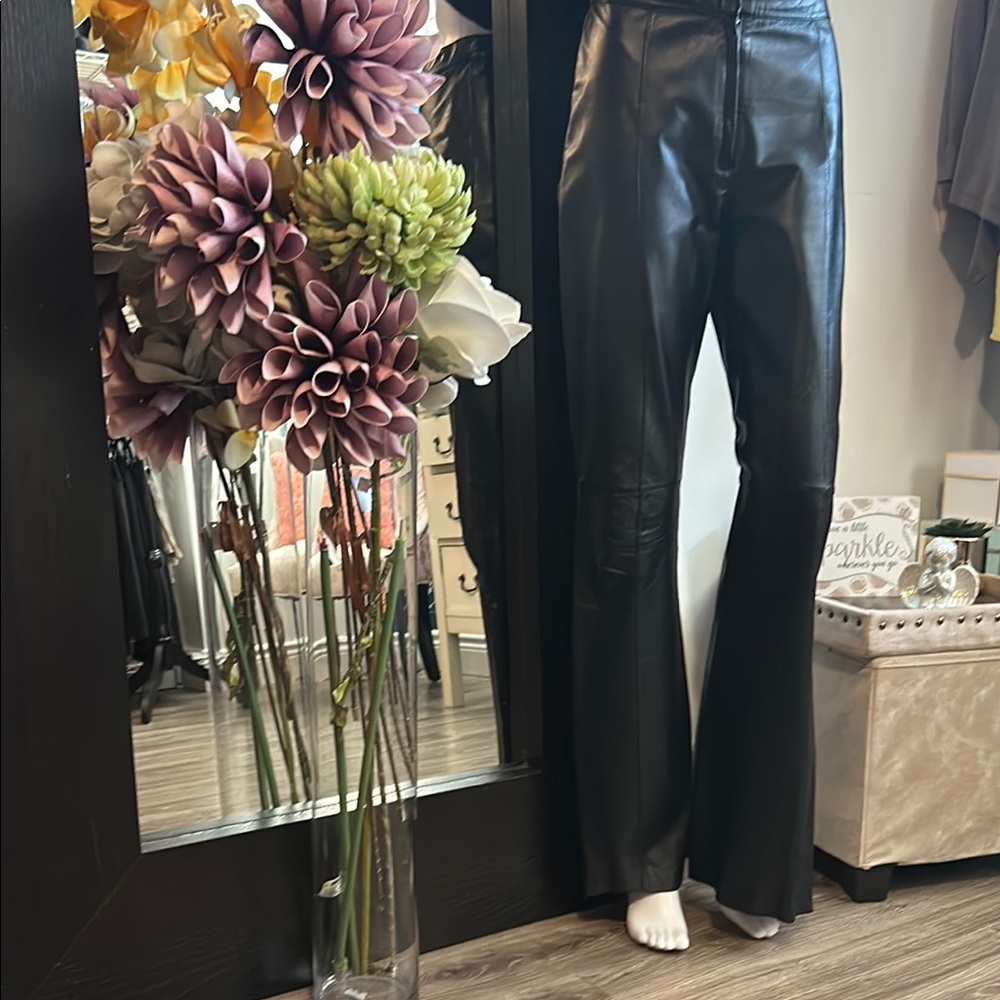 GORGEOUS DANIER Black Leather pants that flare out at the bottom with a zipper. - Picture 7 of 15